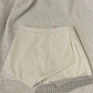 Womens white shorts size medium fits like a small , new with tags